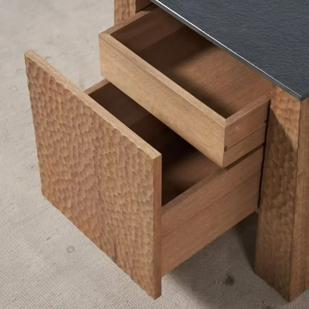 Drawer boxes opened on a hammered-front cabinet