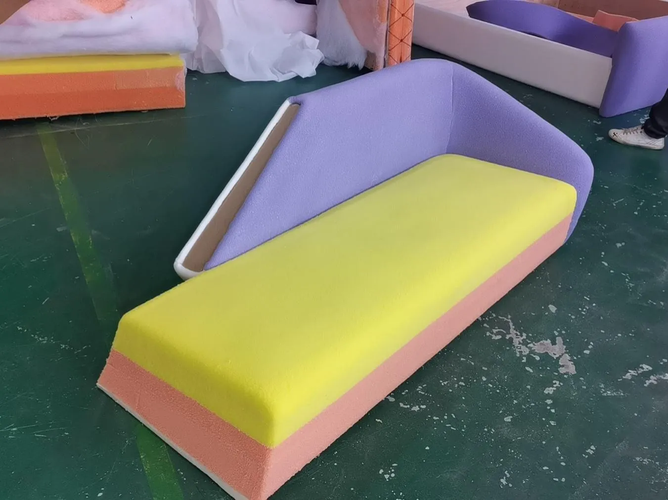 Foam layers cut and colour-blocked before upholstery