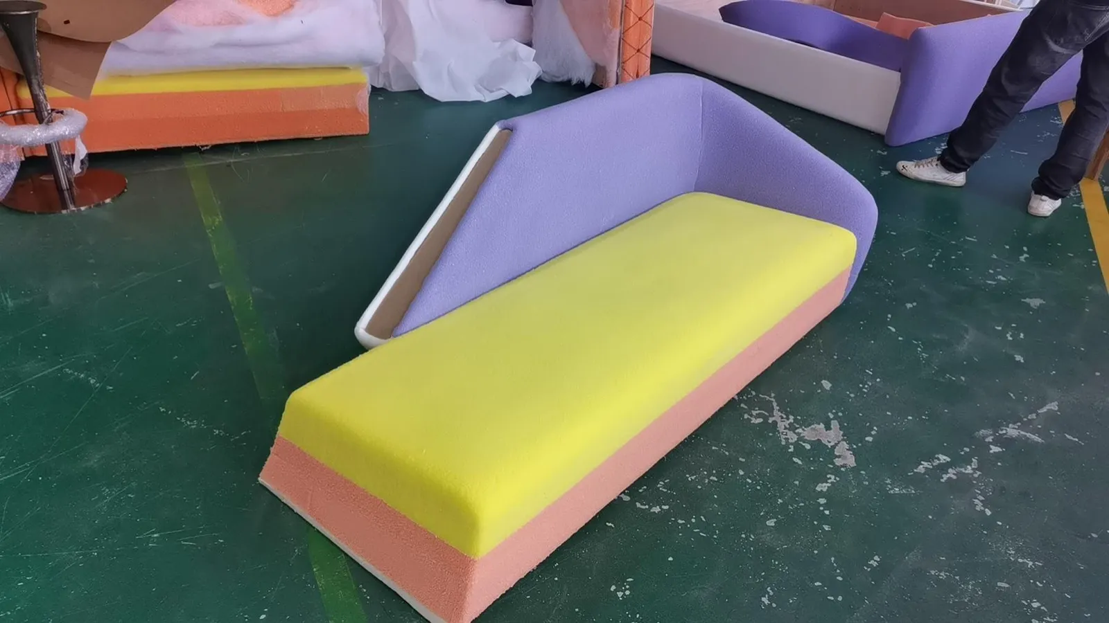 Foam layers cut and colour-blocked before upholstery