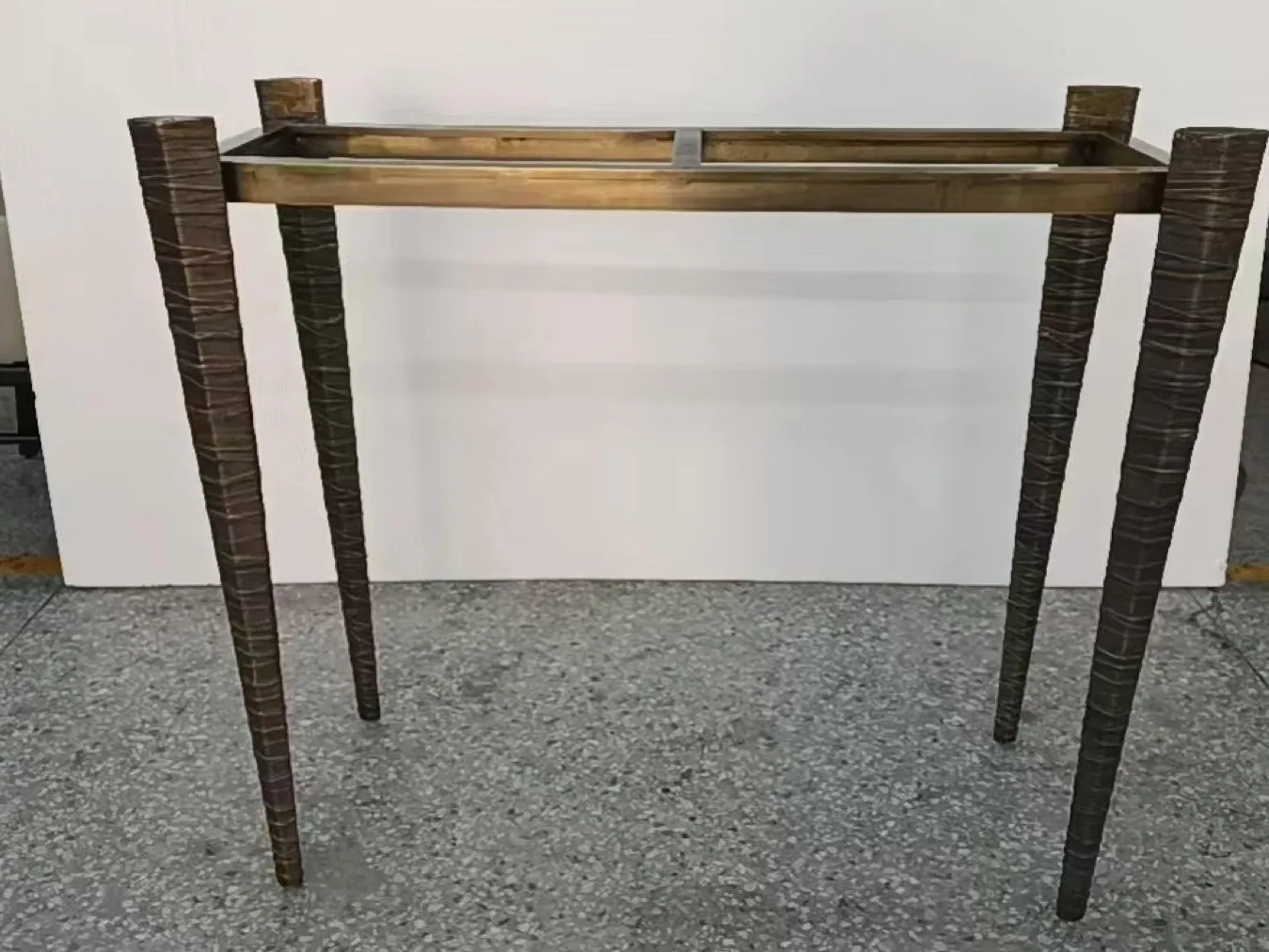 Metal console frame after welding and polishing