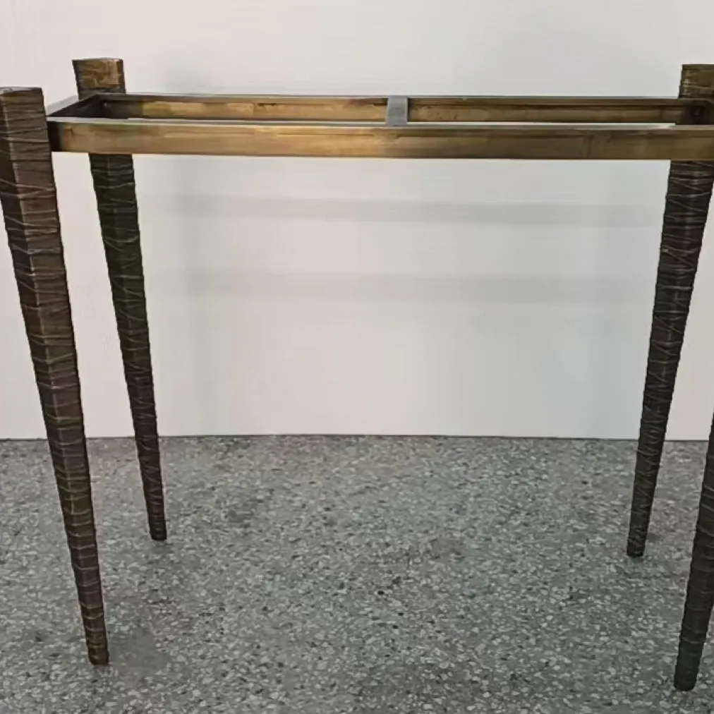 Metal console frame after welding and polishing