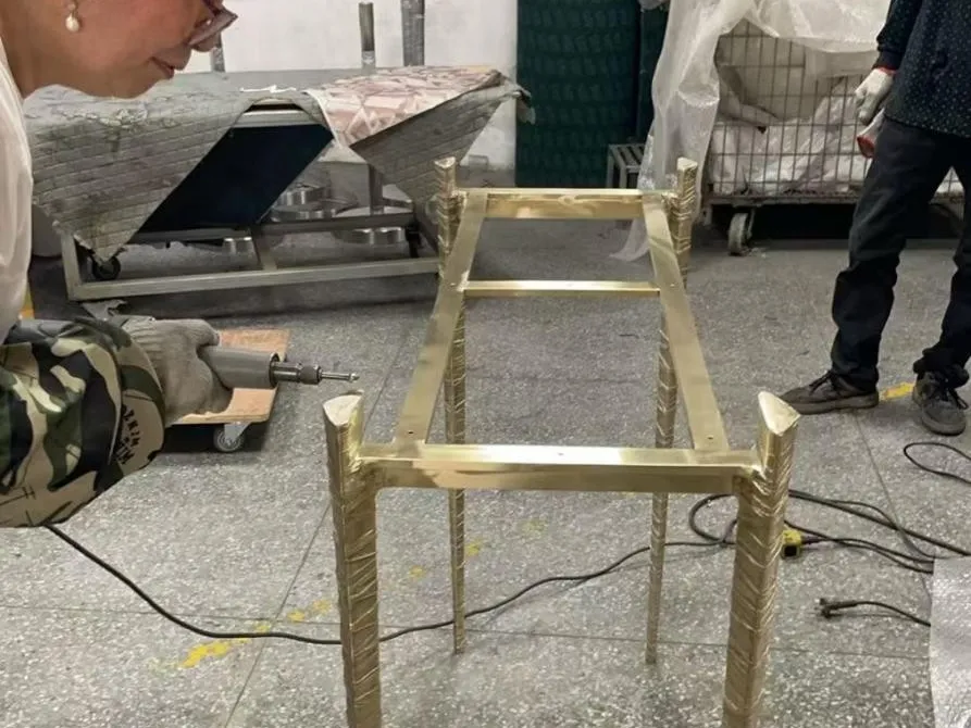Fabricator working on a metal frame