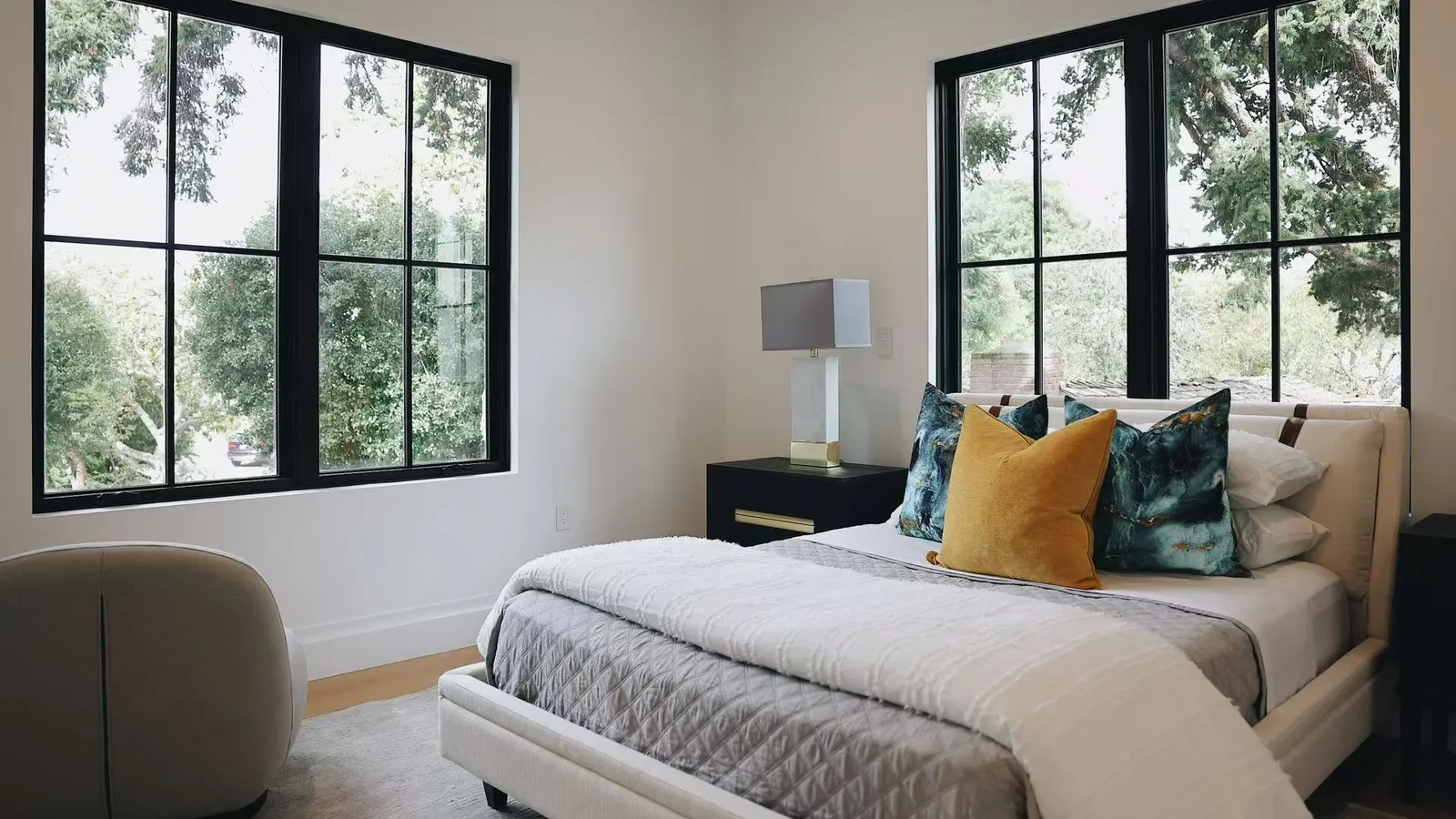 Bedroom with black-framed windows, Menlo Park residence