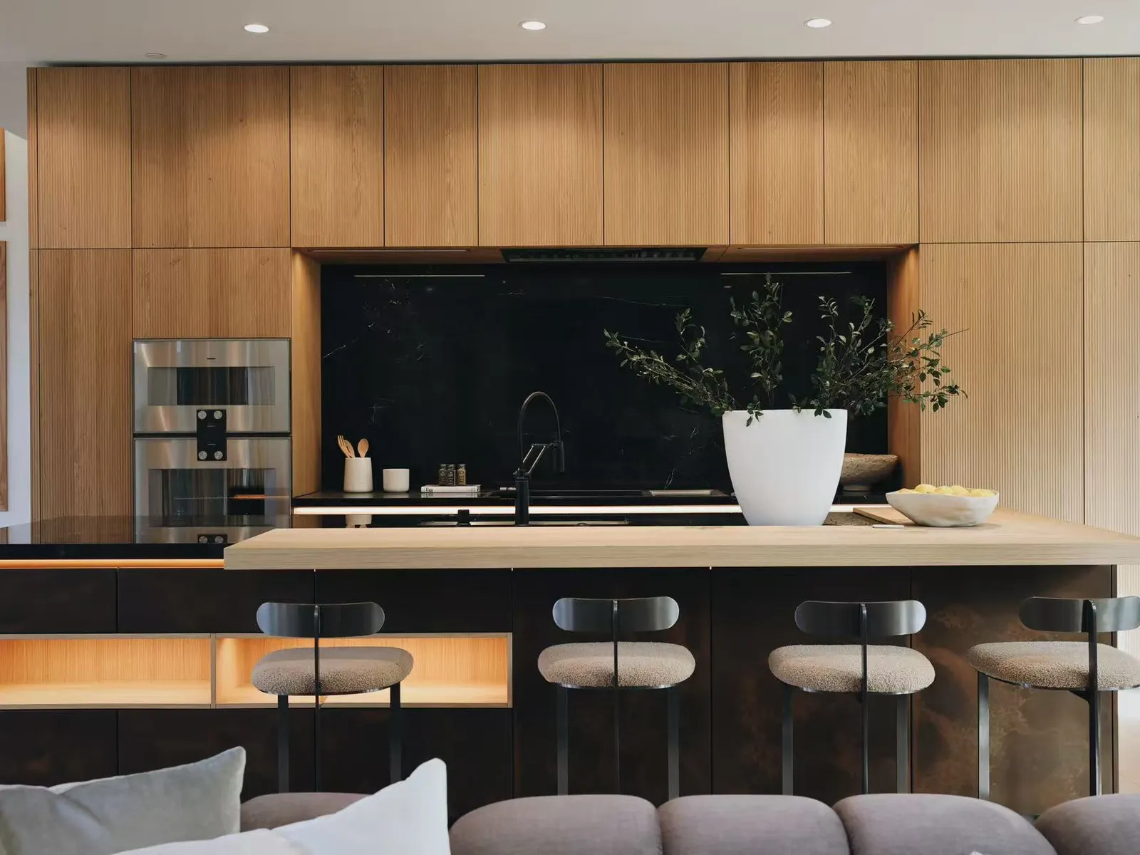 Kitchen with oak cabinetry and dark stone, Palo Alto model home