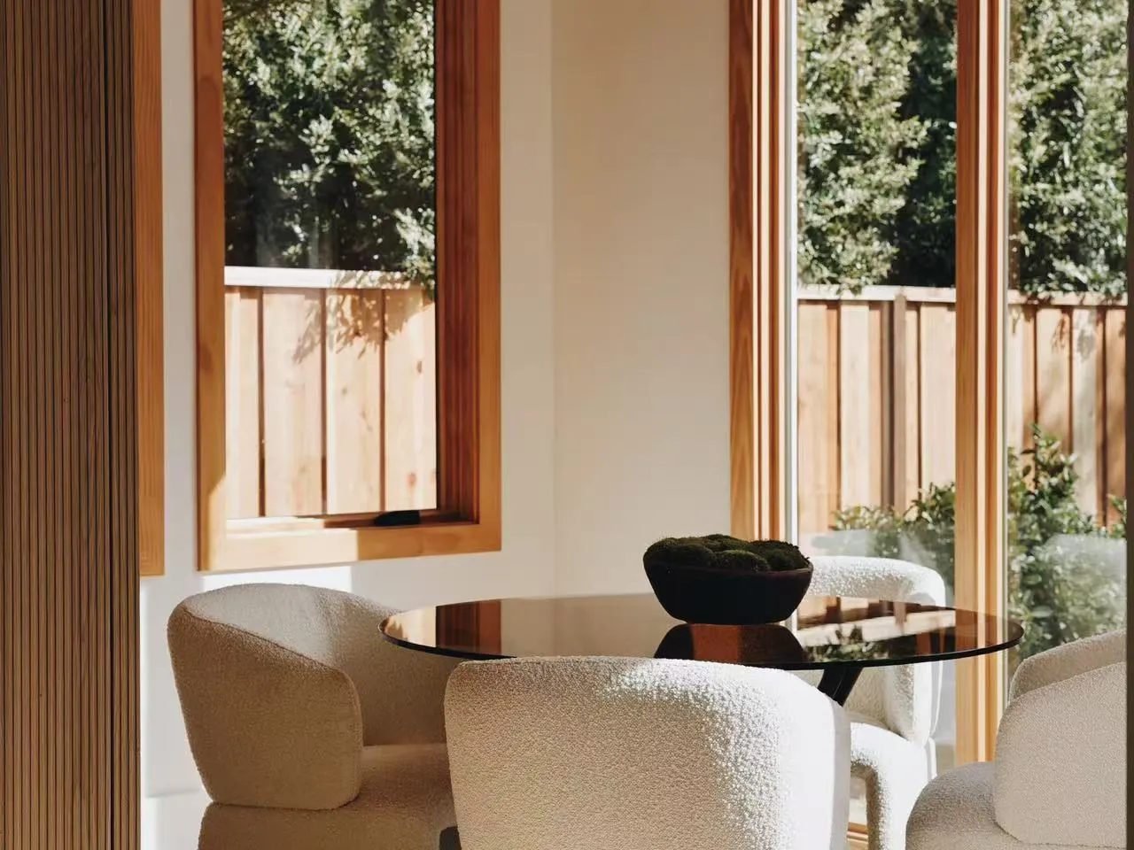 Corner seating by tall windows, Palo Alto model home