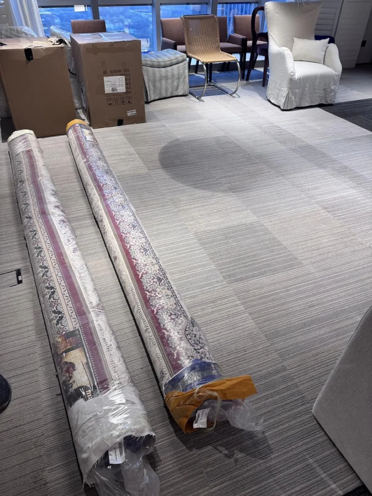 Rolled rugs and furniture packing check