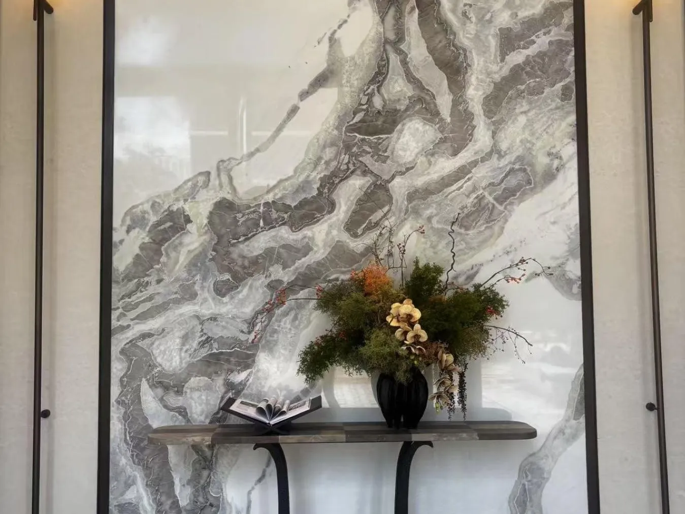 Entry console installed against a stone wall