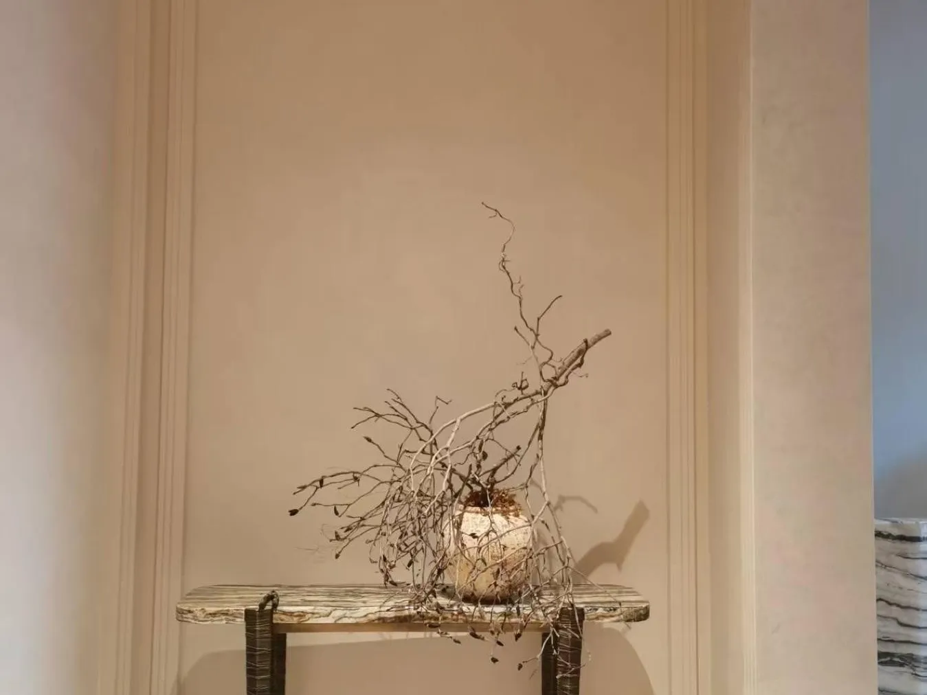 Stone and metal console delivered and placed in a niche