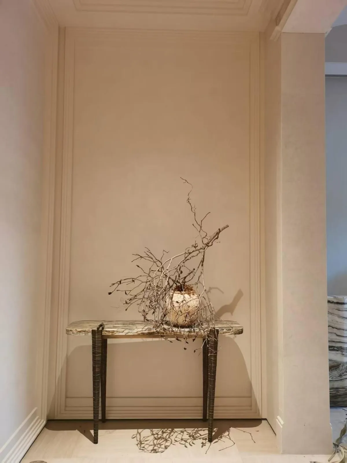 Stone and metal console delivered and placed in a niche