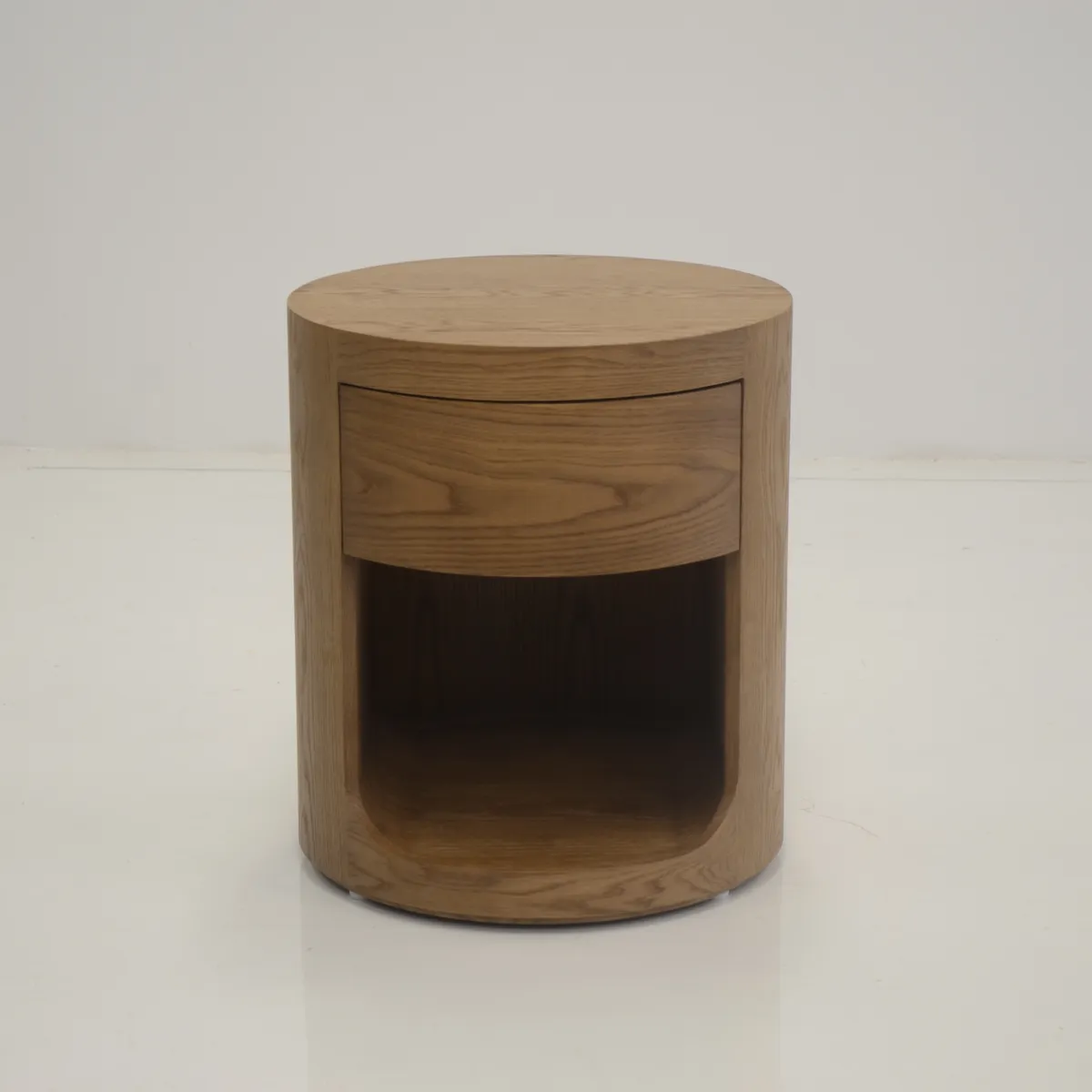 Round nightstand with drawer