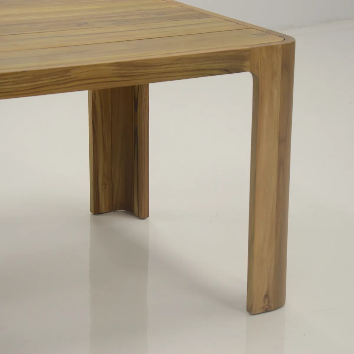 Corner and leg of a solid-wood table