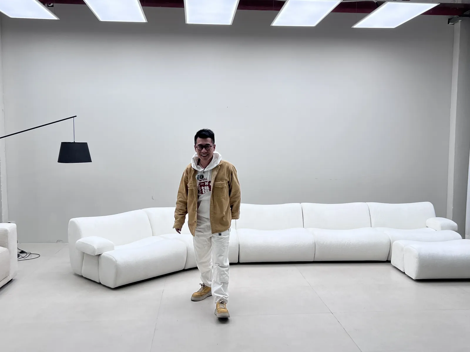 Long modular sofa set up in the white inspection studio