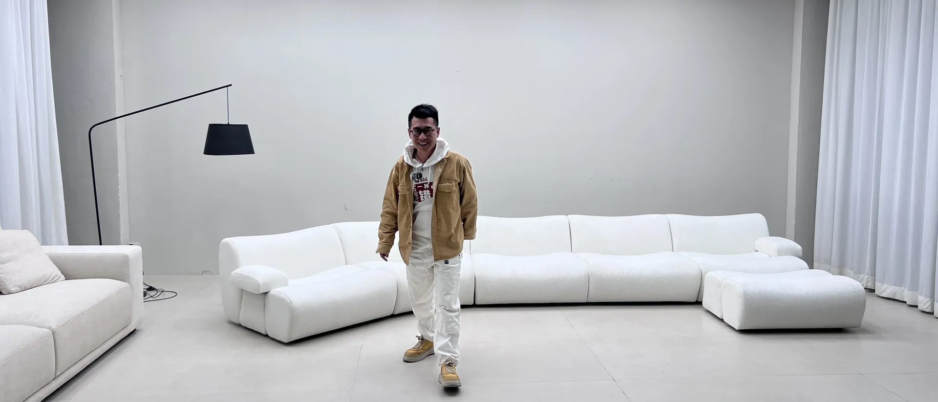Long modular sofa set up in the white inspection studio