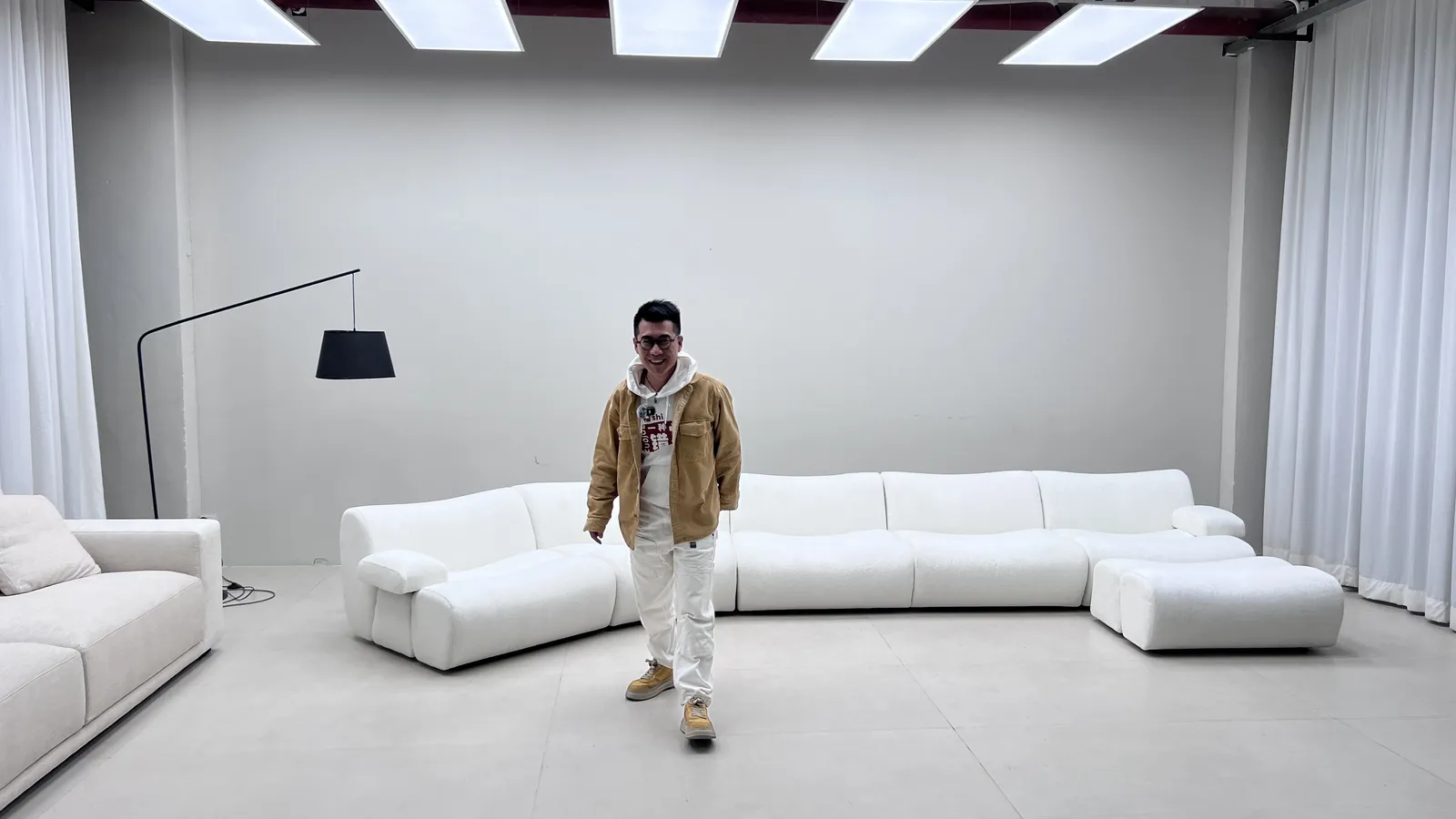 Long modular sofa set up in the white inspection studio