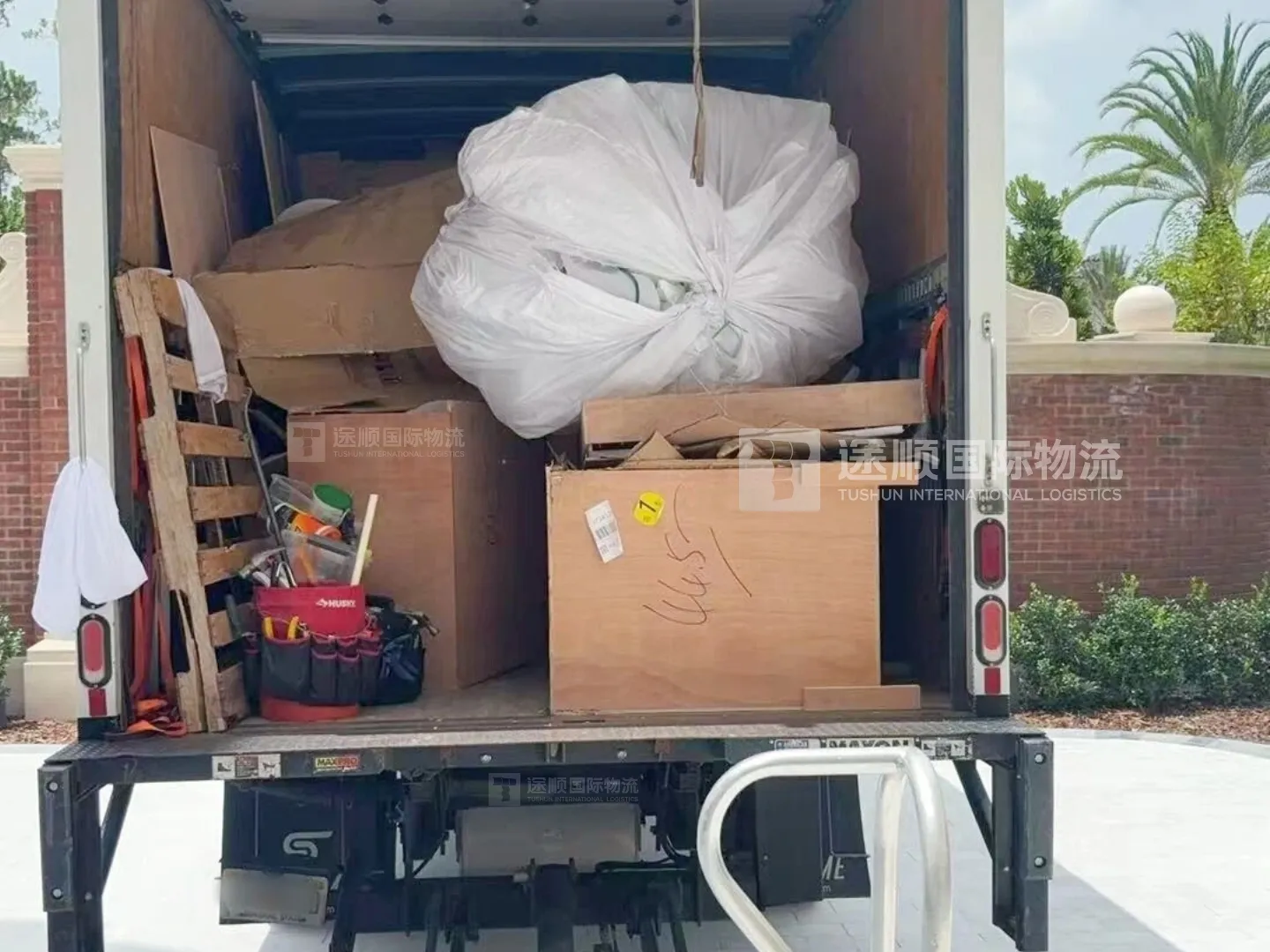 Packaging loaded on the truck for removal after installation