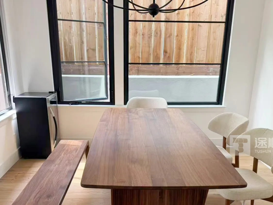 Walnut dining table, bench and chairs installed in San Mateo