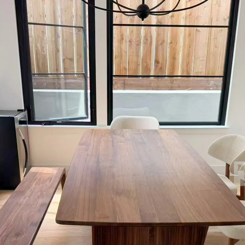 Walnut dining table, bench and chairs installed in San Mateo