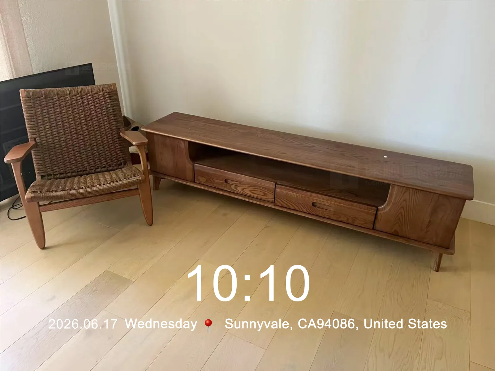 Solid-wood TV unit and armchair installed in Sunnyvale