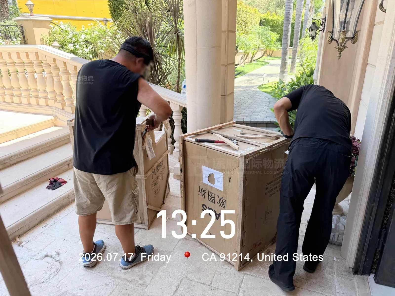 Delivery crew opening cartons at the front door
