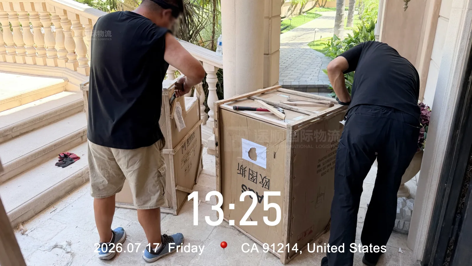 Delivery crew opening cartons at the front door